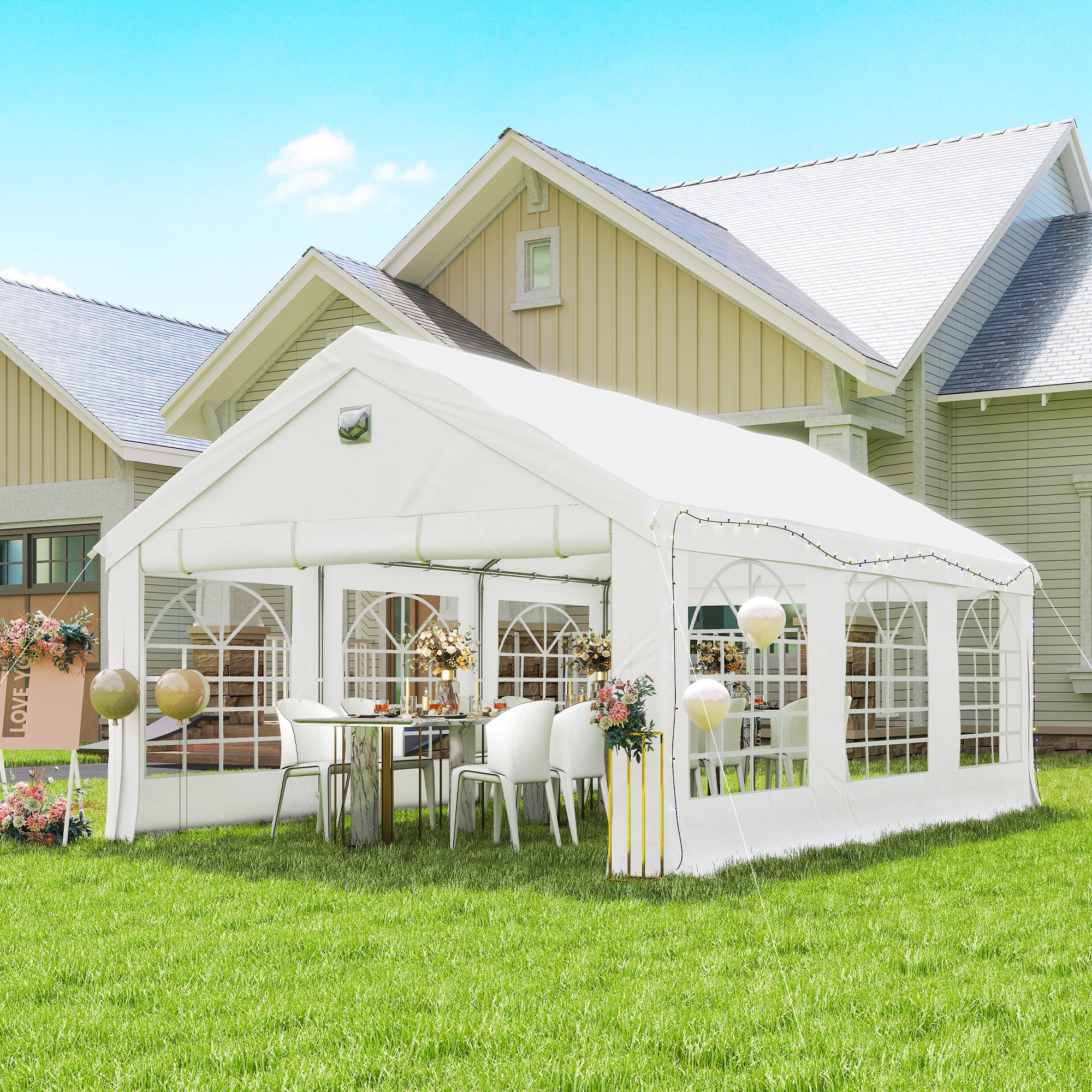 Una carpa blanca con mesas y sillas sobre un césped verde frente a casas.