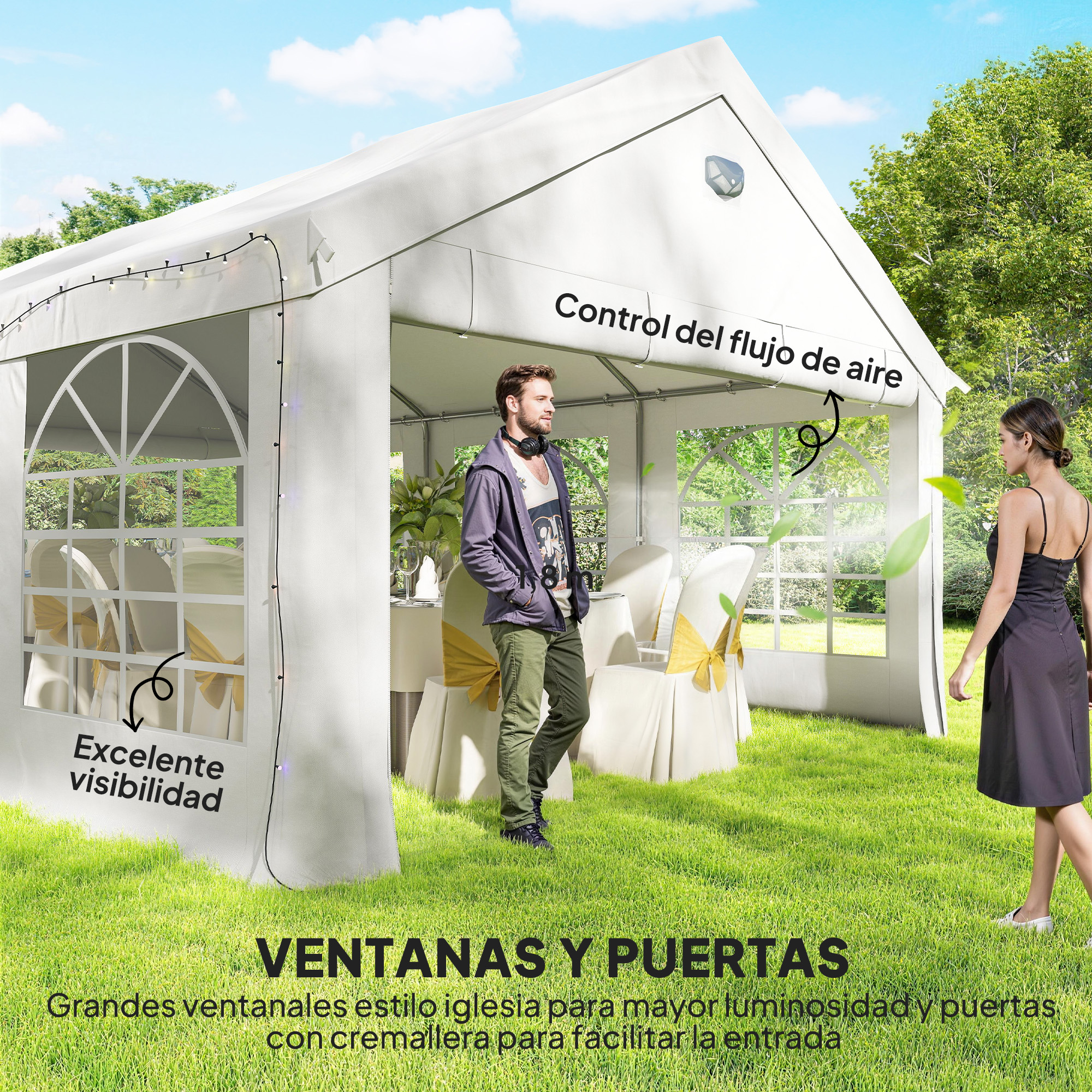 Una carpa blanca con ventanas, mesas y sillas, dos personas en el césped.