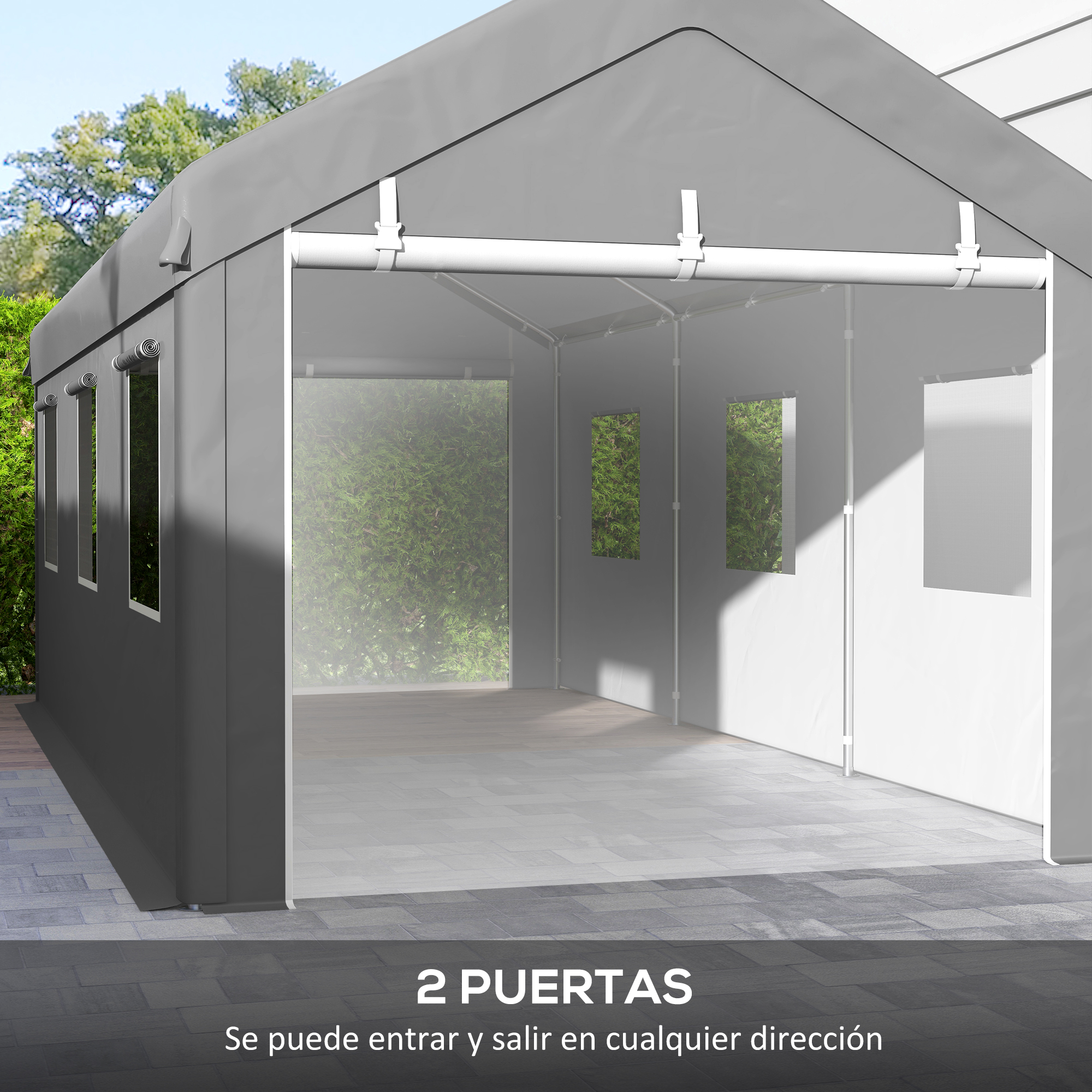 Carpa gris con ventanas y dos entradas abiertas, al aire libre en un jardín.