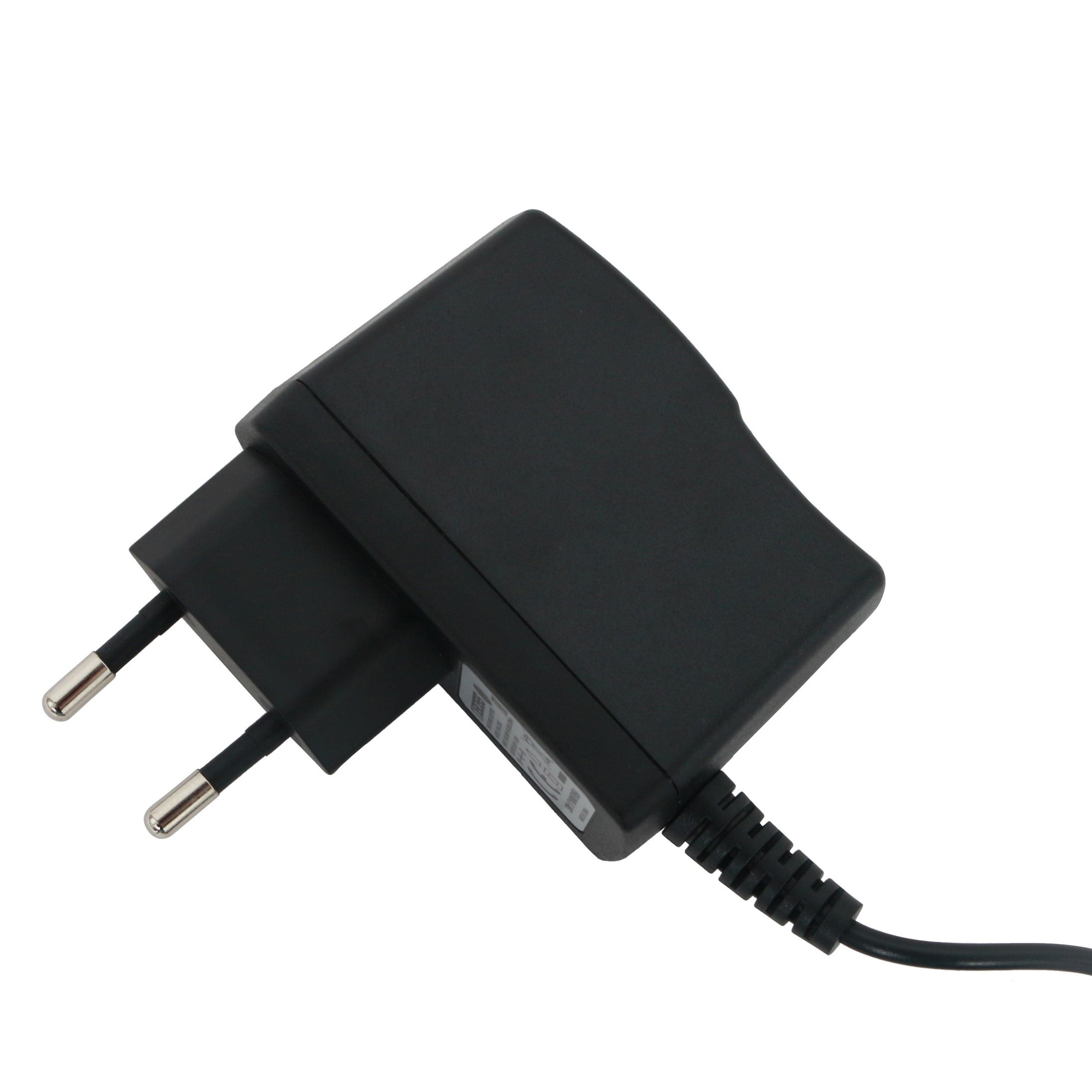 A black power adapter with two metal prongs and a cable.
