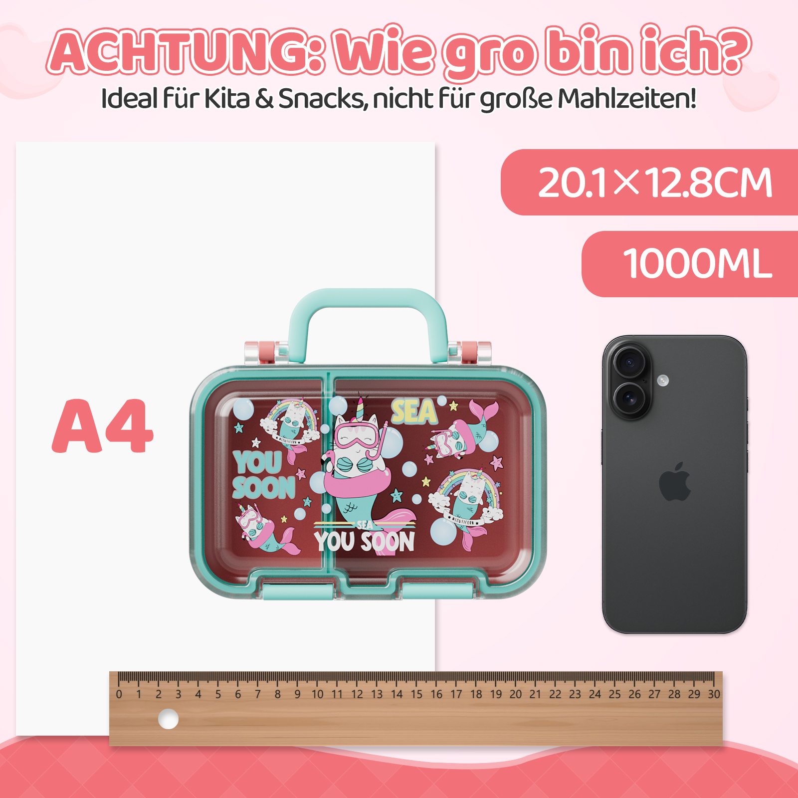 Eine Brotdose mit Katzen-Meerjungfrauen-Motiv, daneben ein Smartphone und ein Lineal.