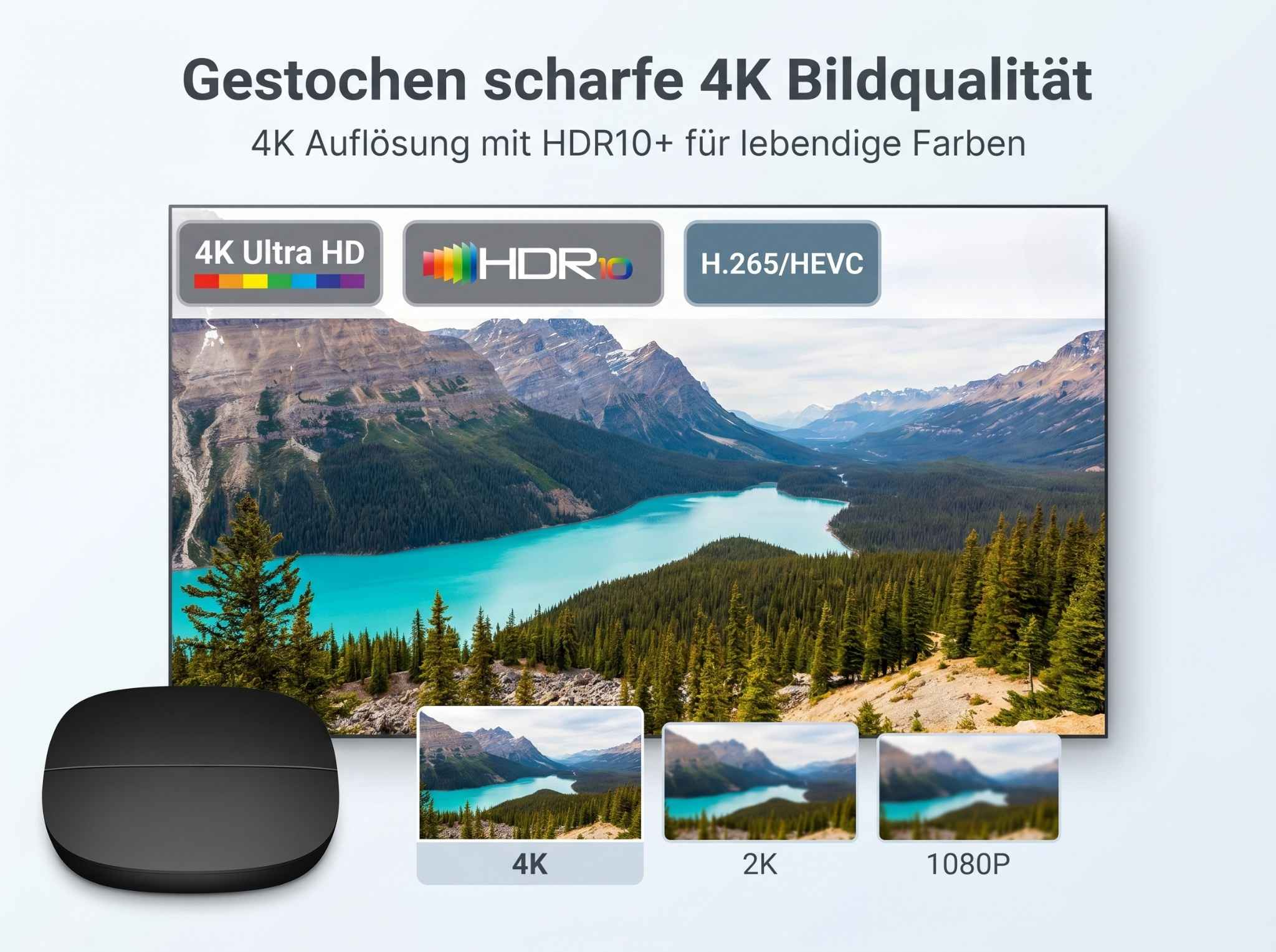 Ein schwarzer Streaming-Player vor einem Fernsehbildschirm mit Berg- und Seenlandschaft.