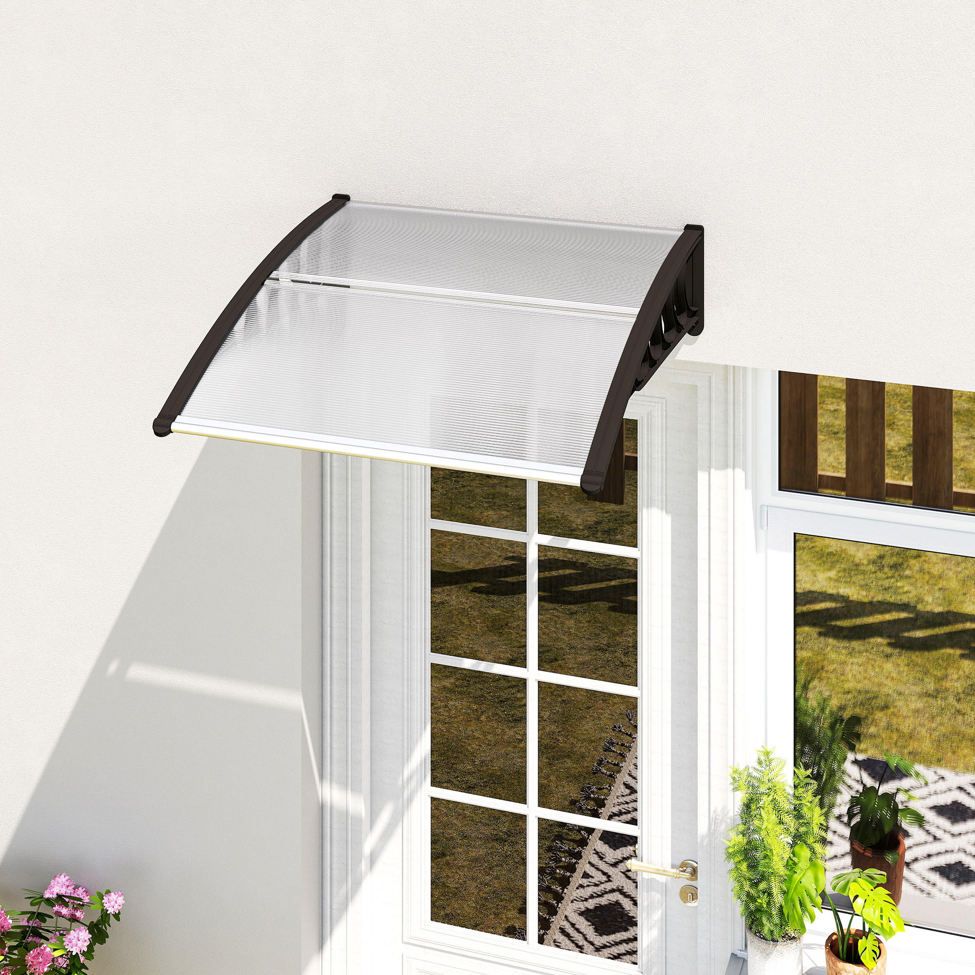 Un toldo sobre una puerta con ventanas y decoración exterior.
