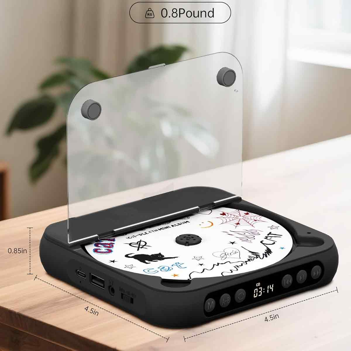 Schwarzer tragbarer CD-Player mit CD, zeigt 03:14, Gewicht 0,8 Pfund.