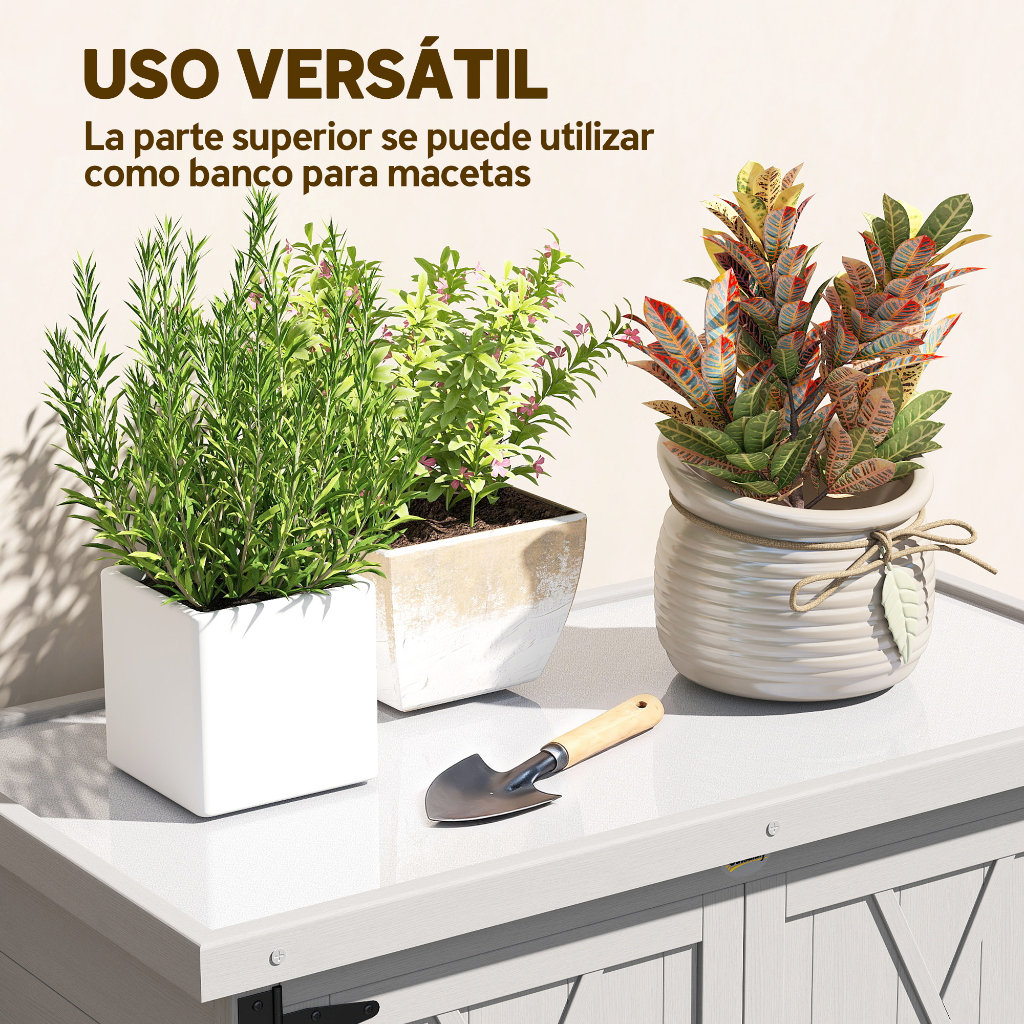 Tres plantas en maceta sobre una superficie blanca con una pala.