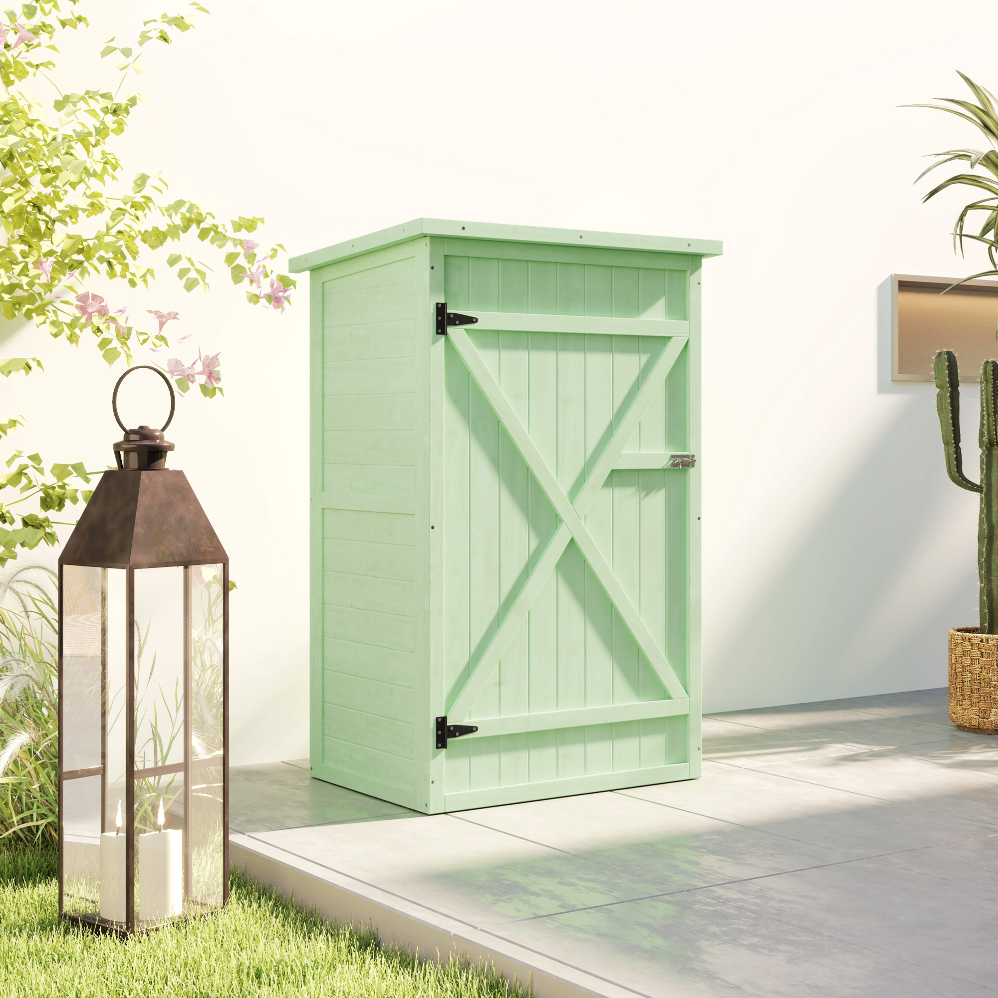 Un cobertizo de jardín verde pastel con puerta de diseño cruzado en un patio.