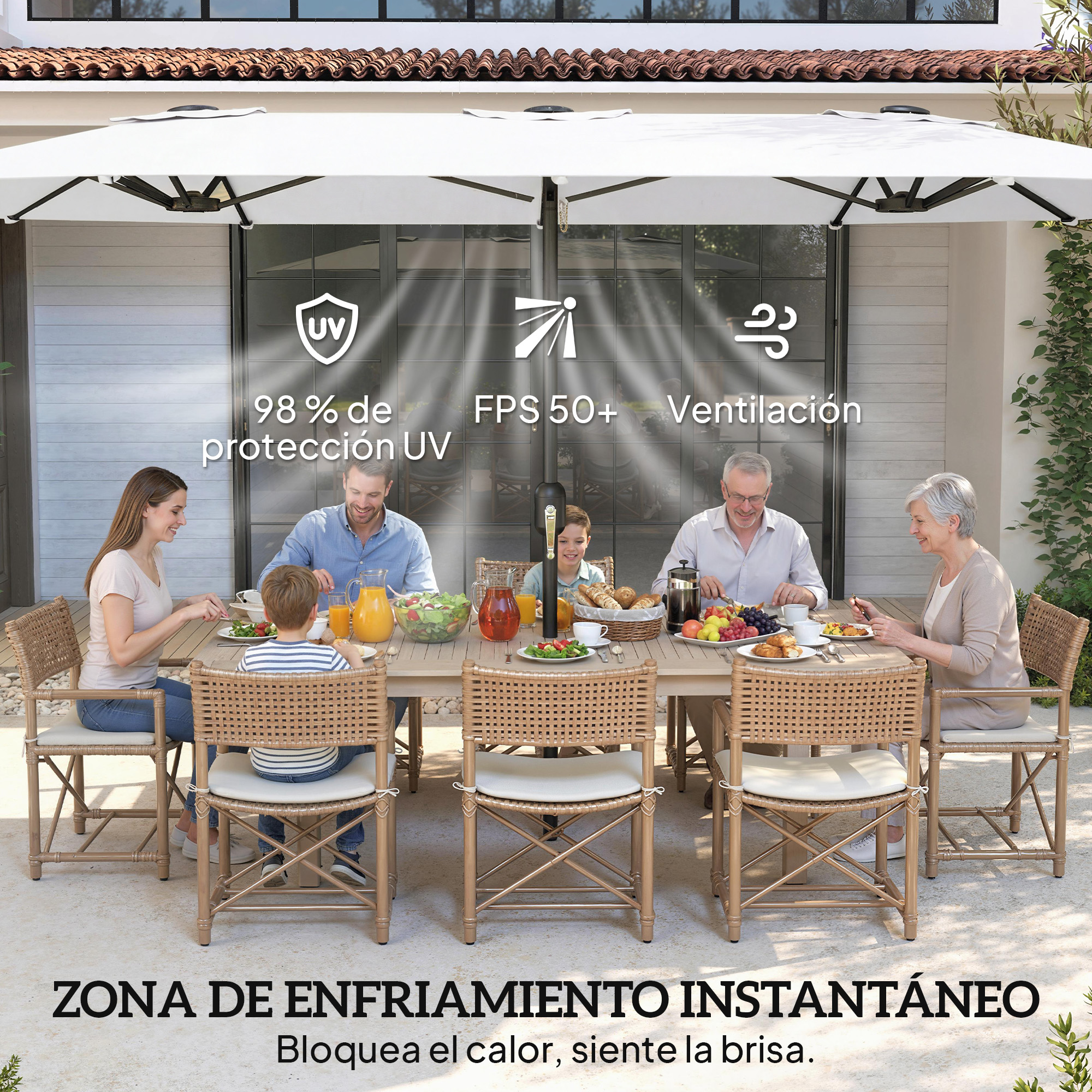 Una familia disfruta de una comida al aire libre bajo un paraguas protector UV.