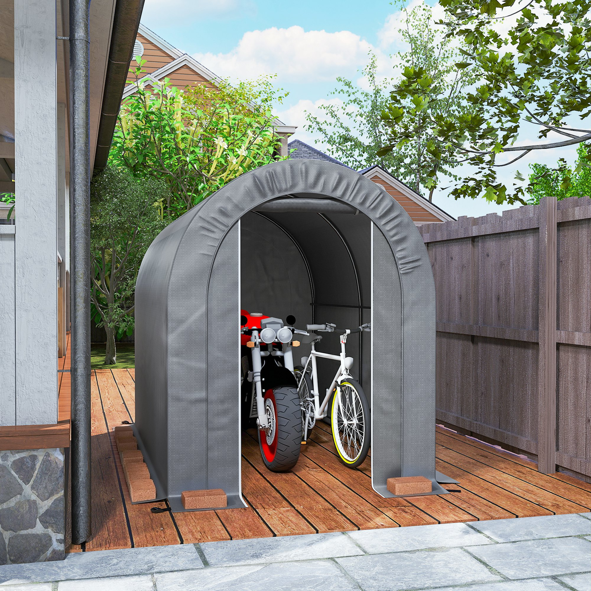 Tienda de almacenamiento gris con motocicleta y bicicleta en cubierta de madera.