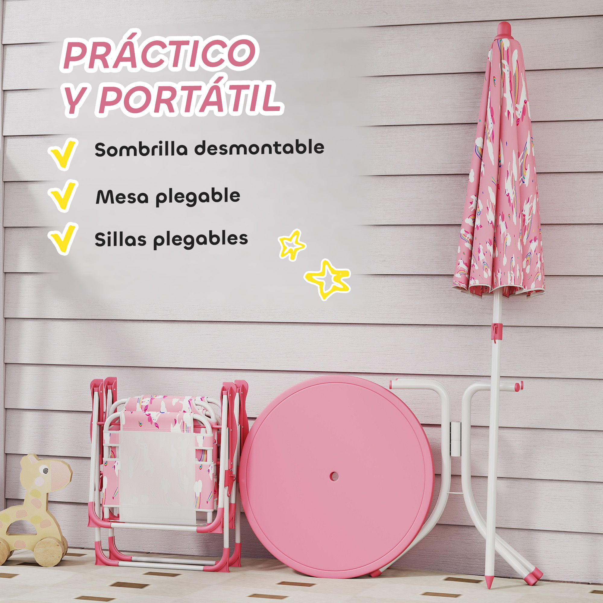 Un paraguas rosa con estampado de unicornios, mesa y sillas.
