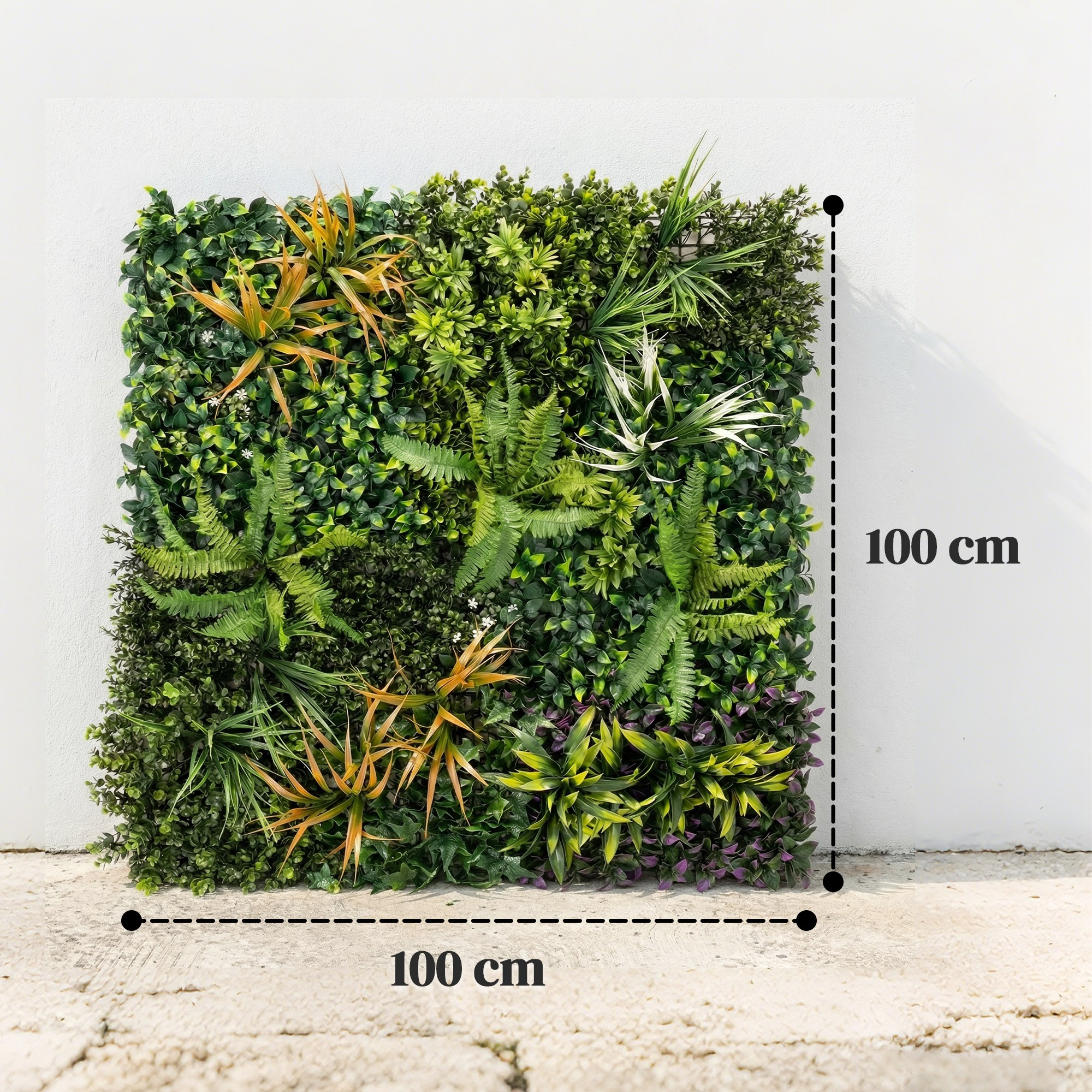 Una pared verde de 100x100 cm hecha de plantas artificiales.