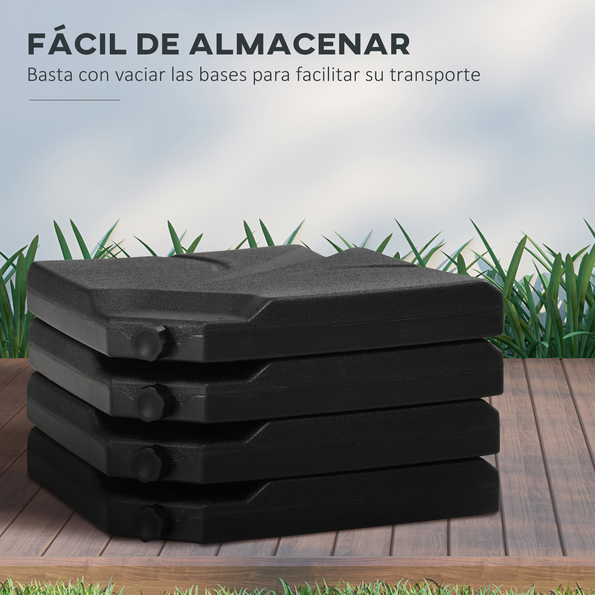 Pila de bases de sombrilla negras y rectangulares sobre tablones de madera, con césped y cielo de fondo.