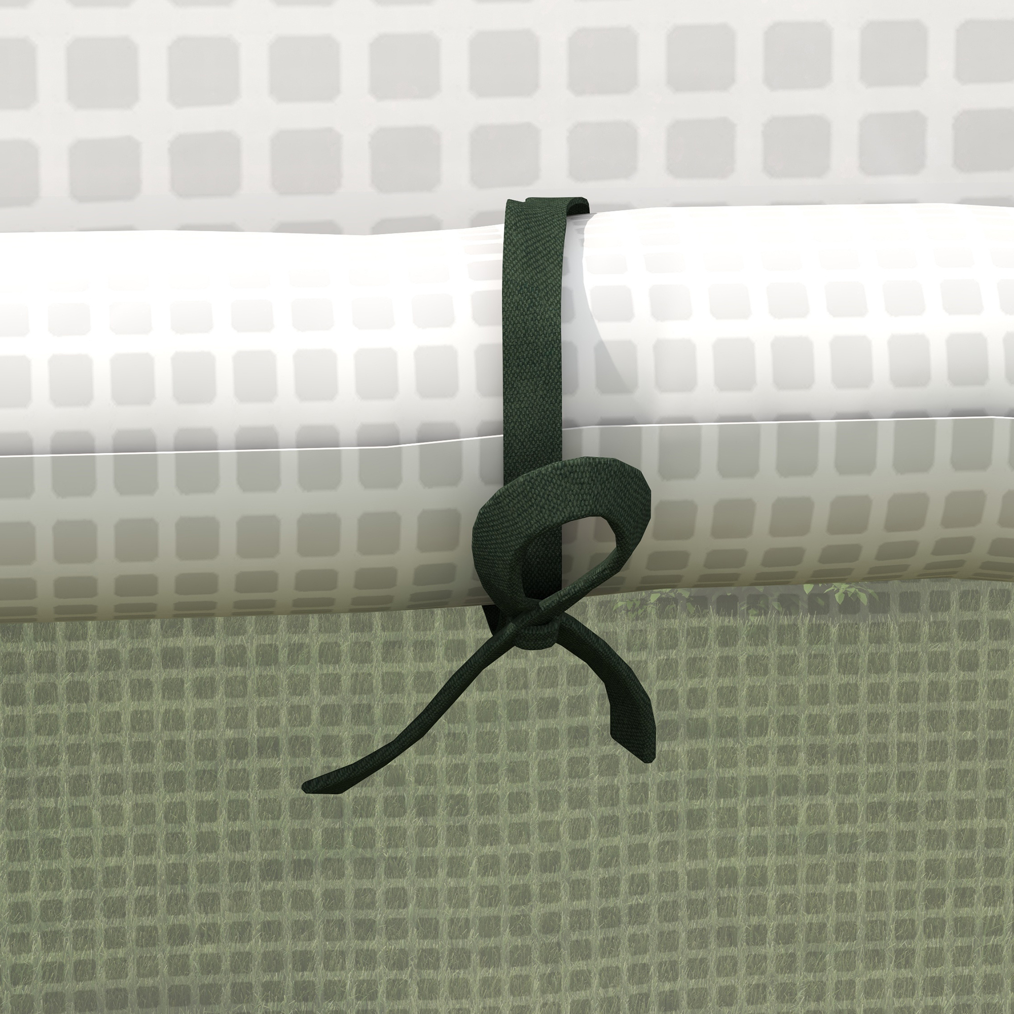 Una cinta verde oscuro está atada alrededor de un rollo blanco, sobre un fondo estampado.