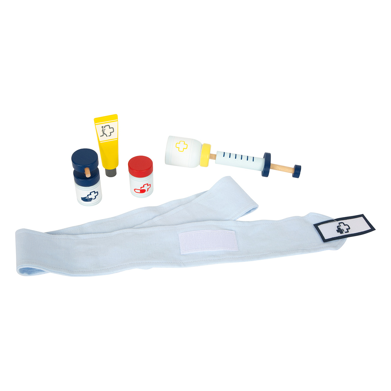 Ein Kinderspielzeug-Arztset mit Spritze, Salbe, Pillendosen und Bandage.
