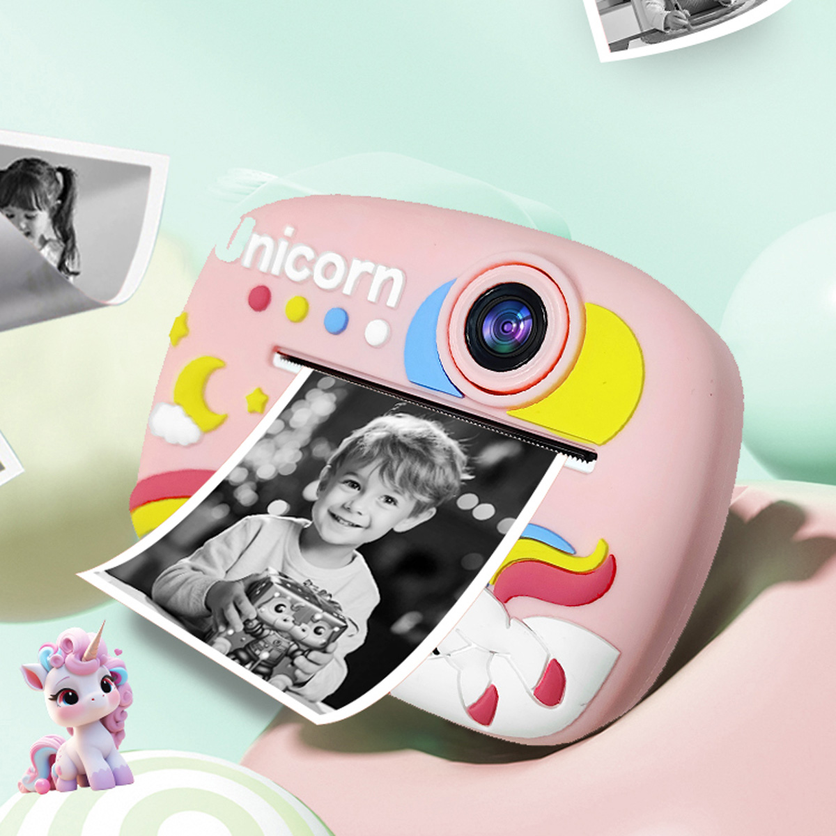 Impresora rosa de unicornio con foto de niño. Cerca hay una figurita de unicornio.