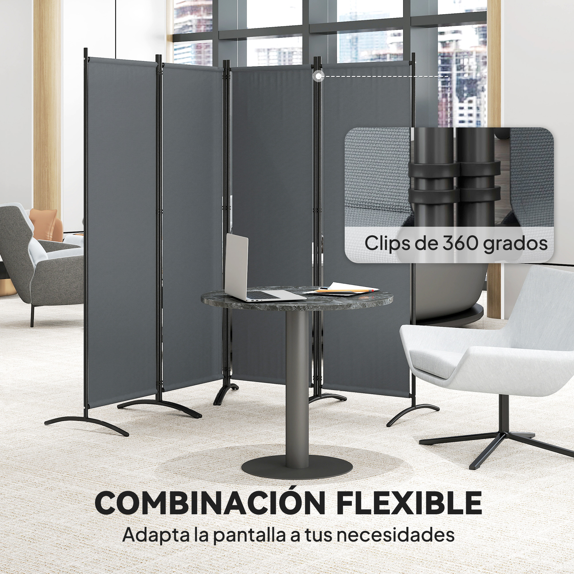 Divisor de habitación gris con portátil, bolígrafo y cuaderno sobre mesa redonda.