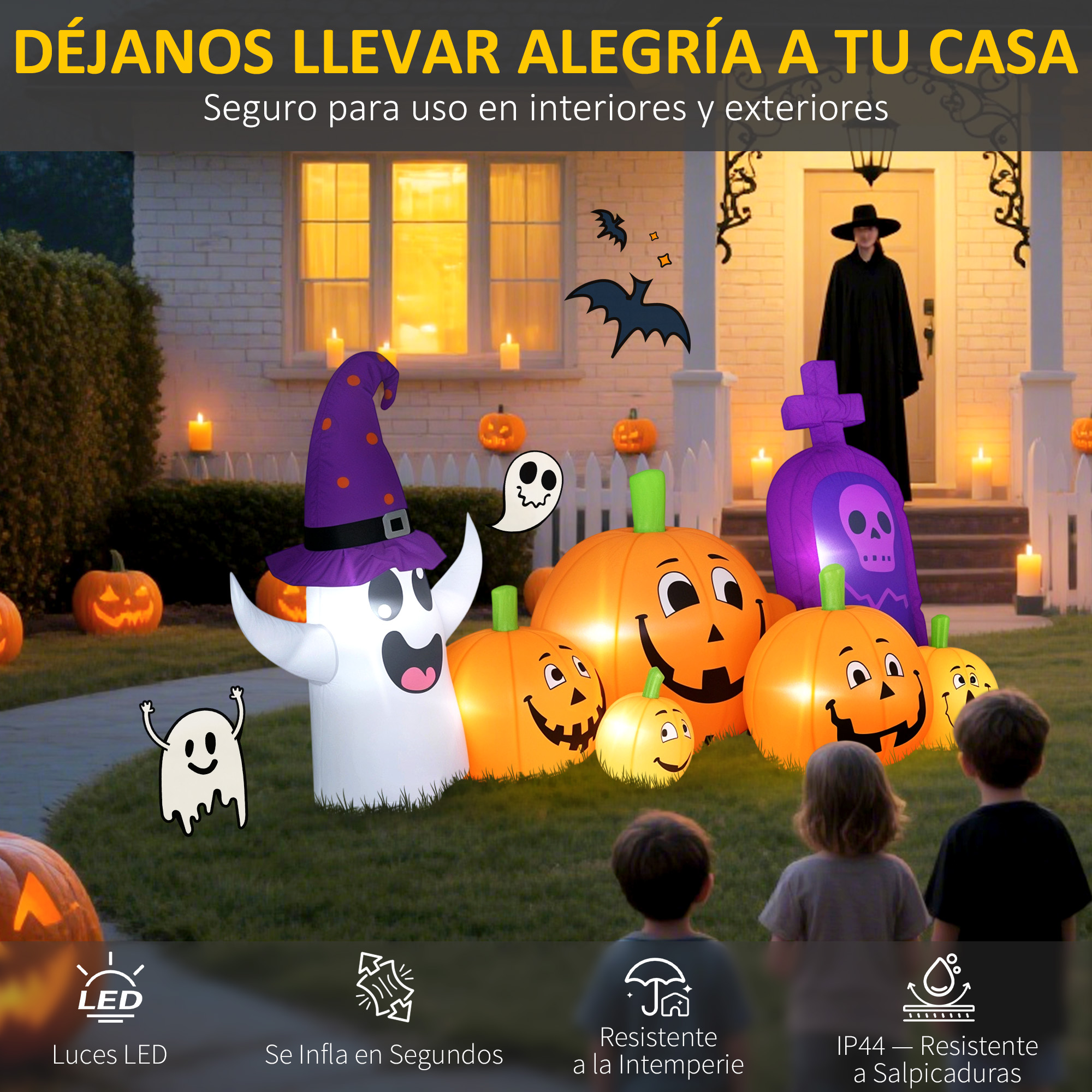 Decoraciones inflables de Halloween frente a una casa con calabazas, fantasmas y murciélagos.