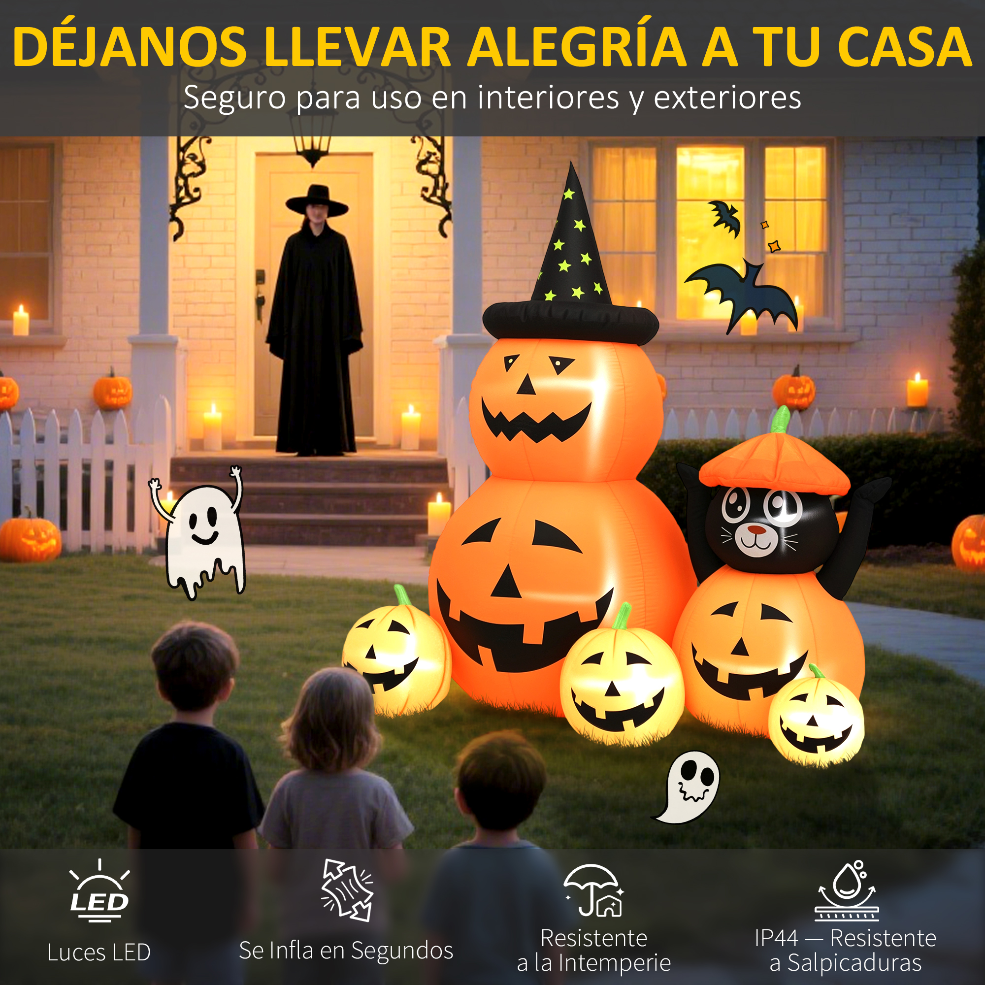 Decoraciones inflables de Halloween frente a una casa con niños.