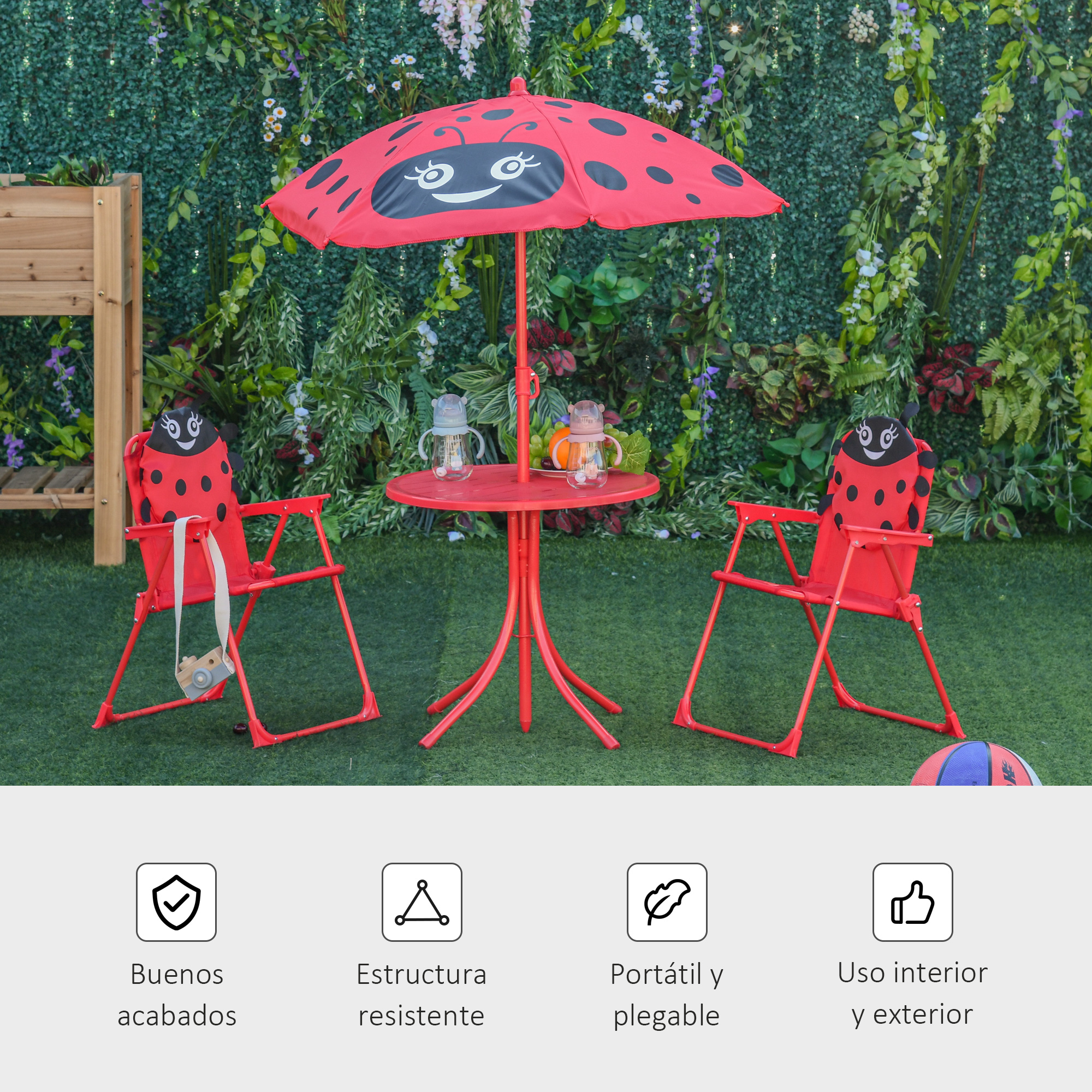 Mobiliario rojo con temática de mariquita: dos sillas, mesa y sombrilla.