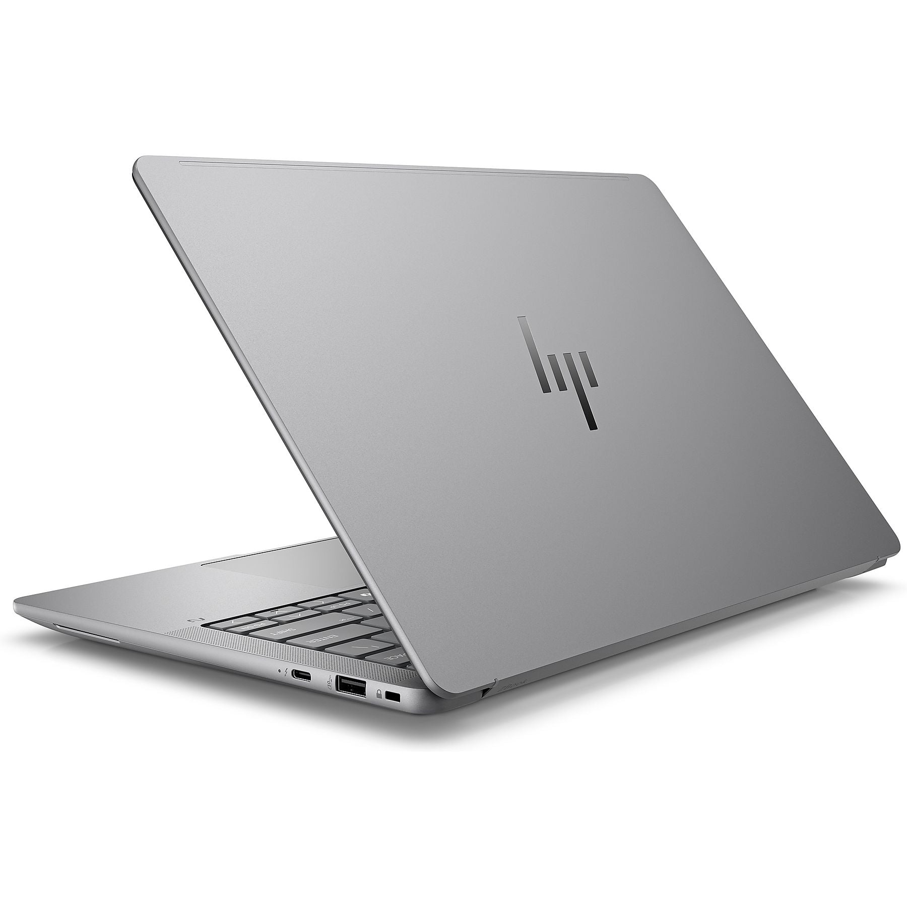 Un laptop HP argentato, leggermente aperto, che mostra tastiera e porte.