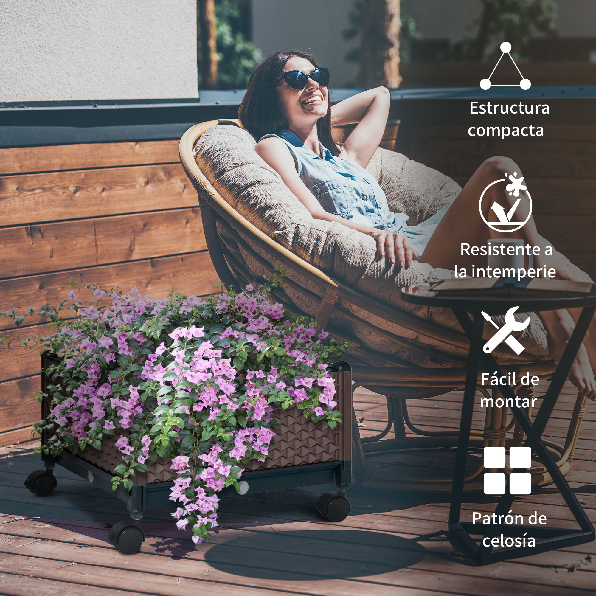 Mujer relajándose en silla junto a jardinera con flores rosas. Entorno exterior.
