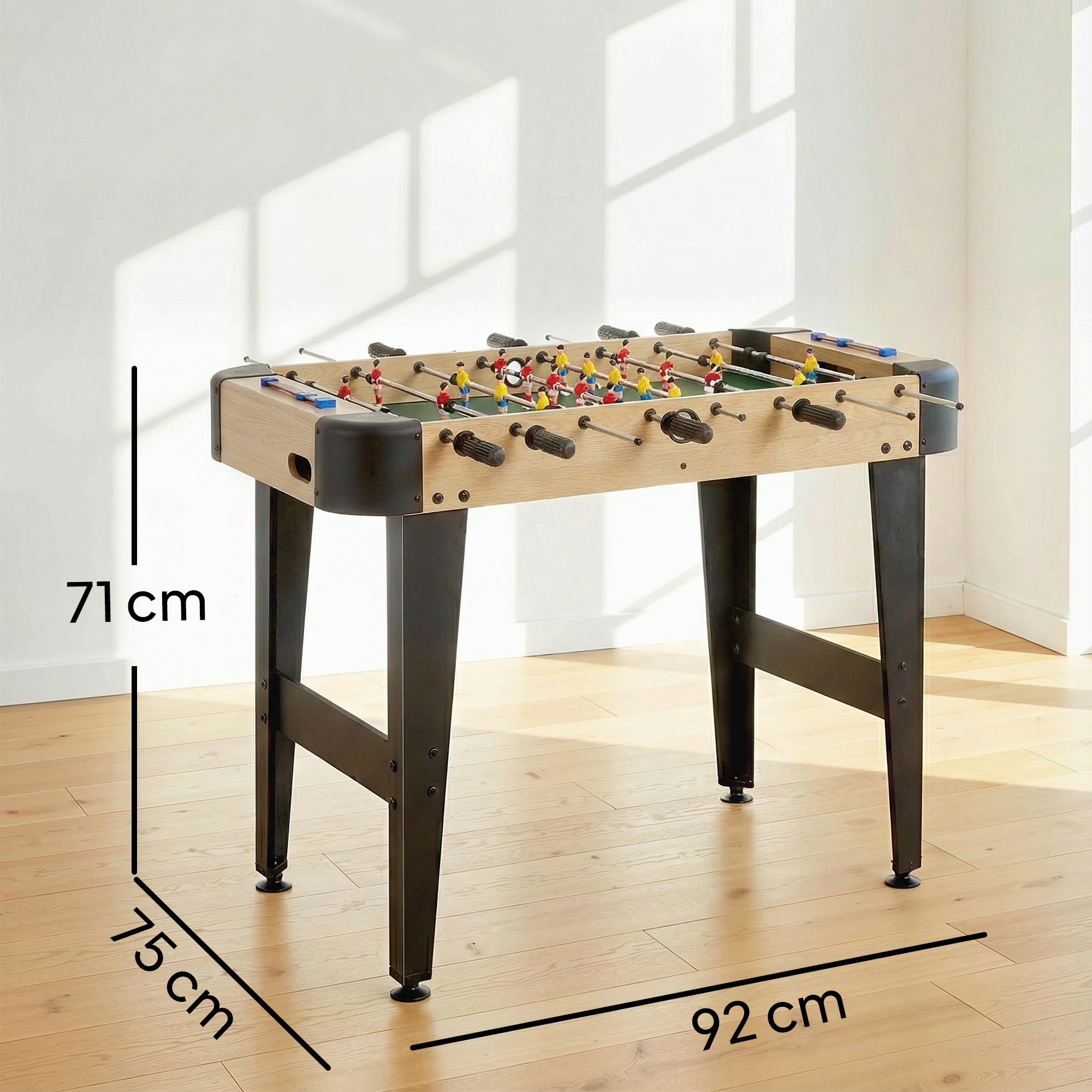 Mesa de futbolín con marco de madera, patas negras y jugadores rojos y amarillos.