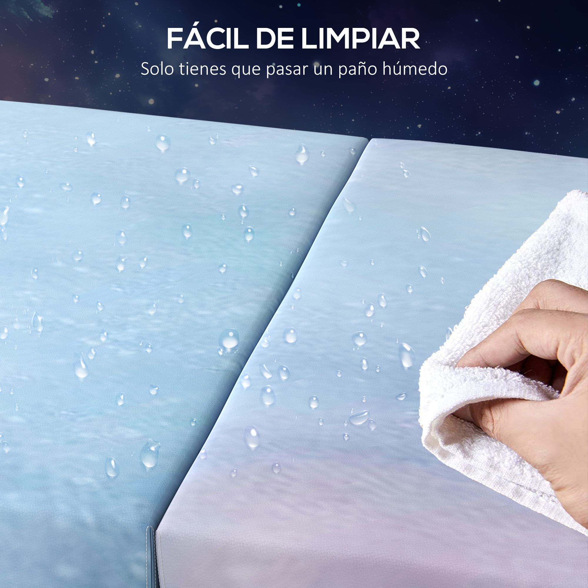 Una mano limpia una superficie azul con gotas de agua con un paño blanco.
