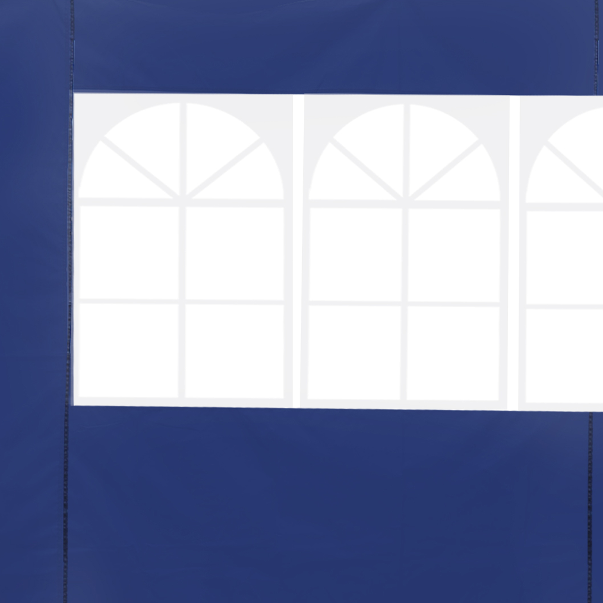 Una carpa azul con ventanas blancas.