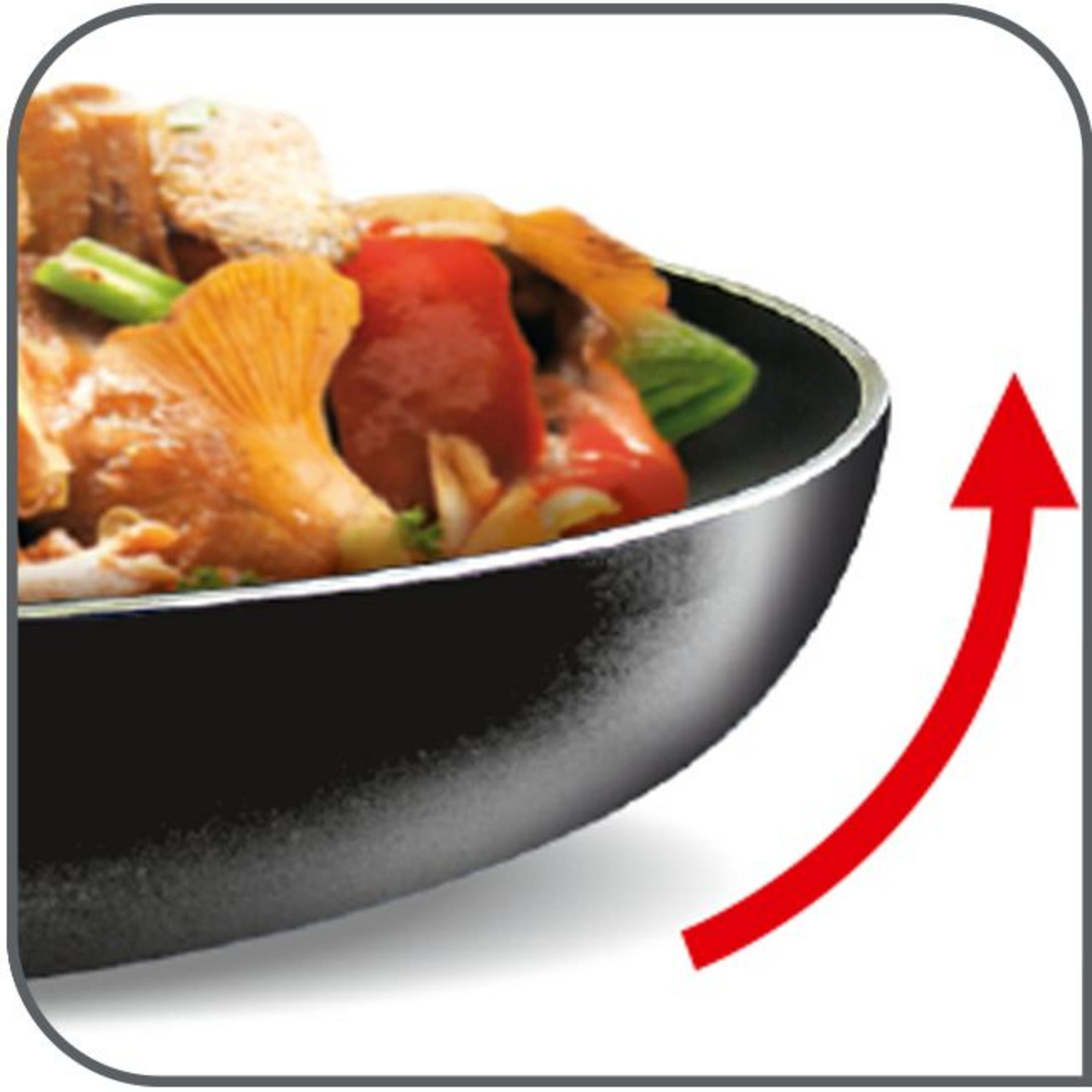 Frying pan with cooked food and a red arrow pointing up.
