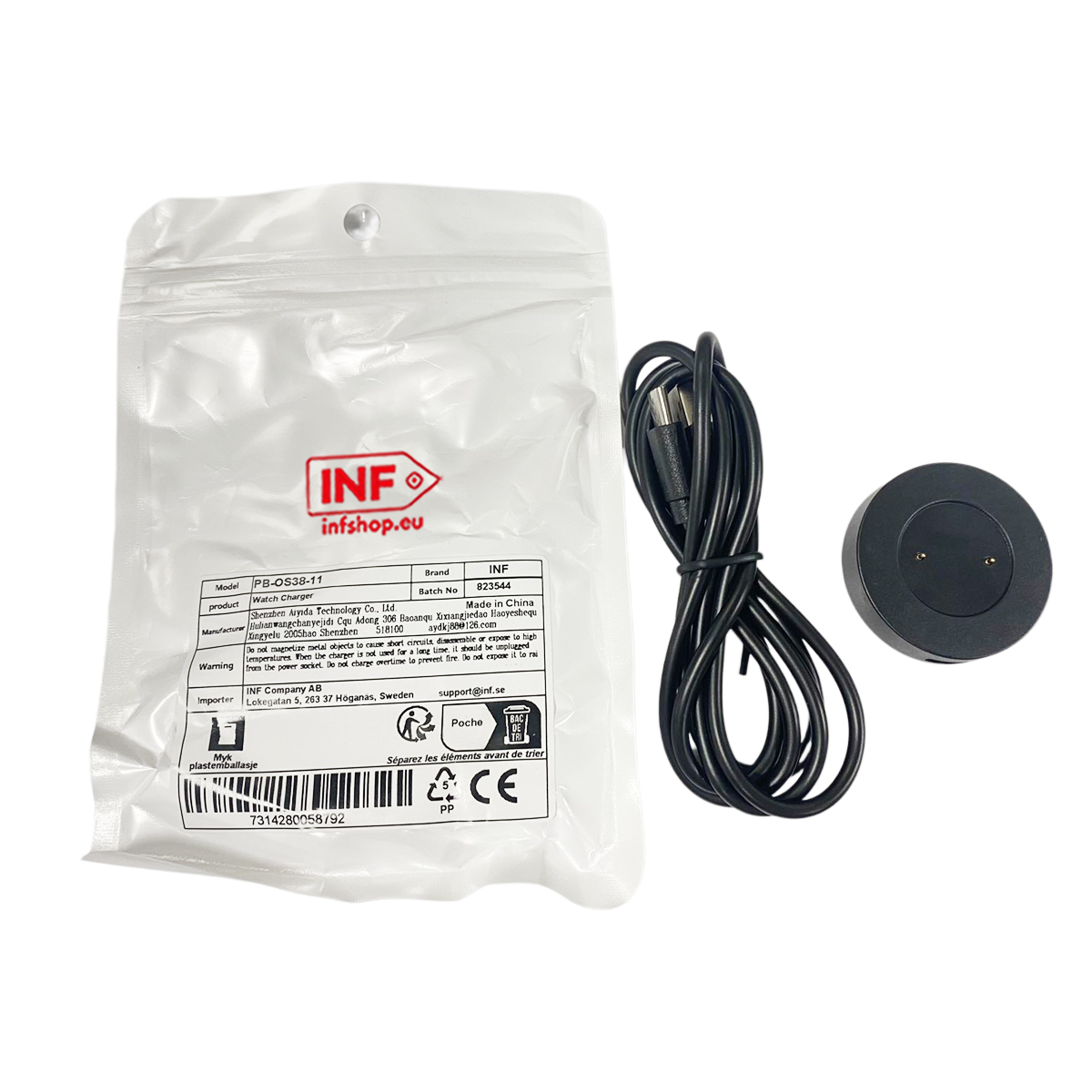 Ein schwarzes Ladekabel und ein Ladeadapter für eine Uhr liegen neben der Verpackung.
