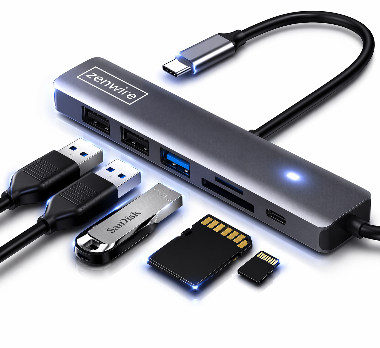 Szary hub USB-C z pendrive'ami i kartami SD na białym tle.