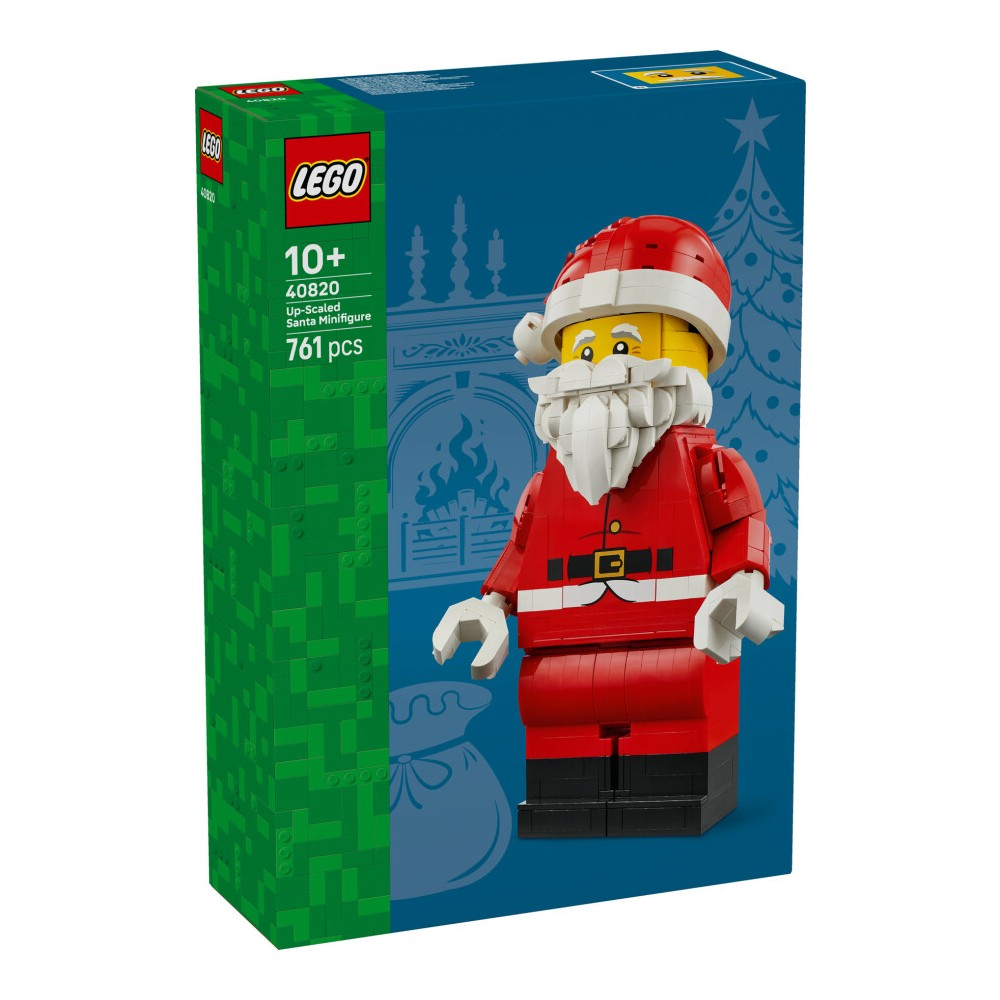 Mavi arka plan üzerinde Noel Baba figürü, şömine ve Noel ağacı olan Lego kutusu.