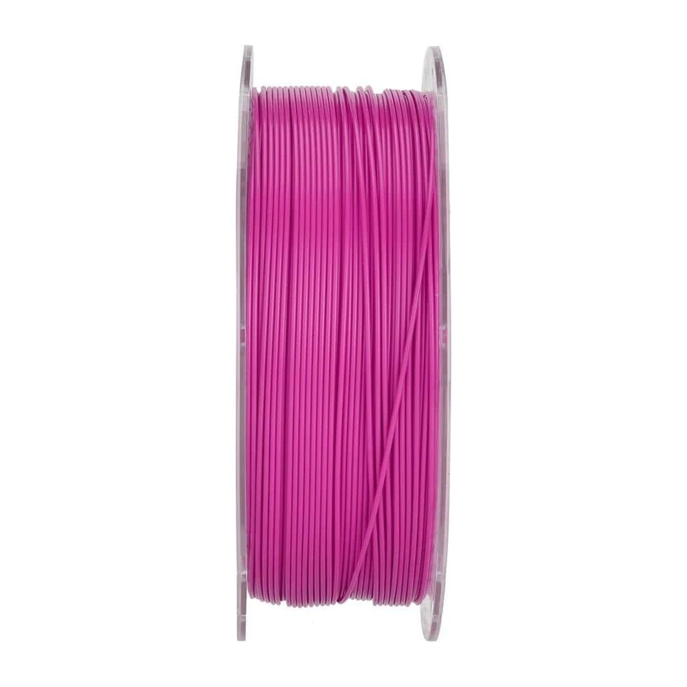 Una bobina di filamento per stampa 3D rosa acceso su sfondo bianco.