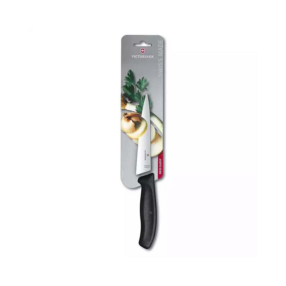 Victorinox Kochmesser mit schwarzem Griff und Zwiebeln und Petersilie auf Verpackung.