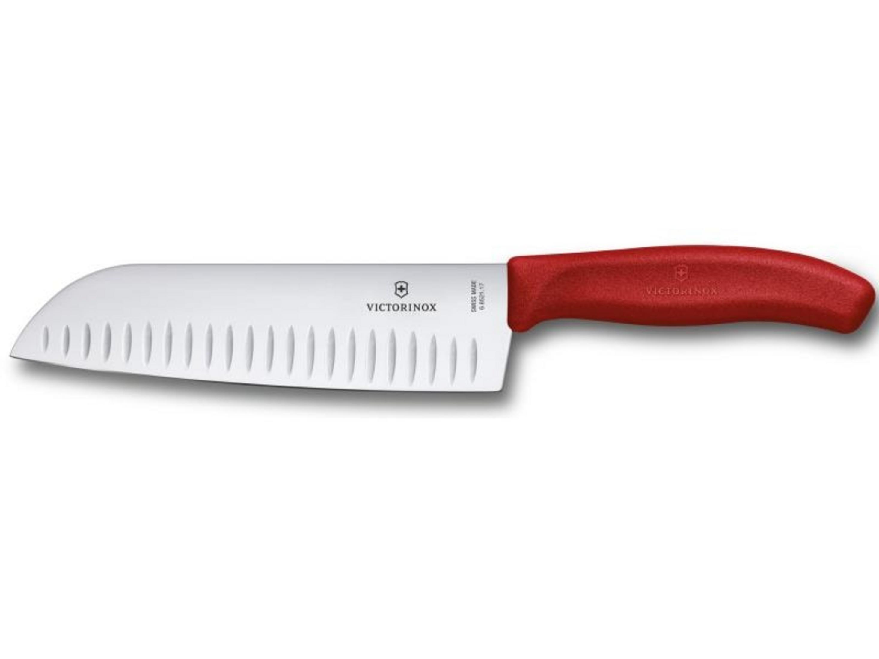 Ein Victorinox Kochmesser mit rotem Griff und Wellenschliff.