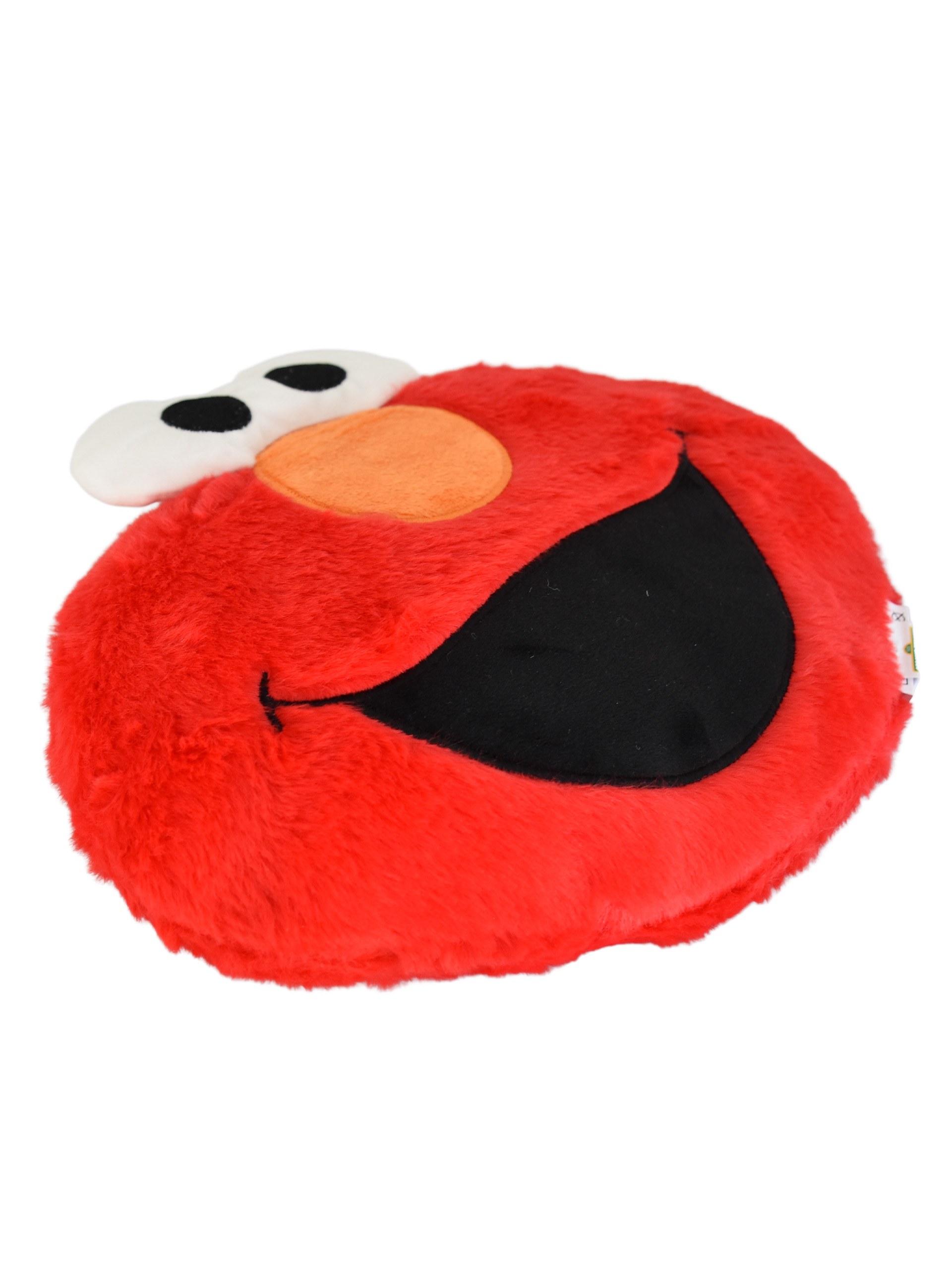Ein rotes Plüschtier von Elmo mit großen Augen und einem breiten Lächeln.