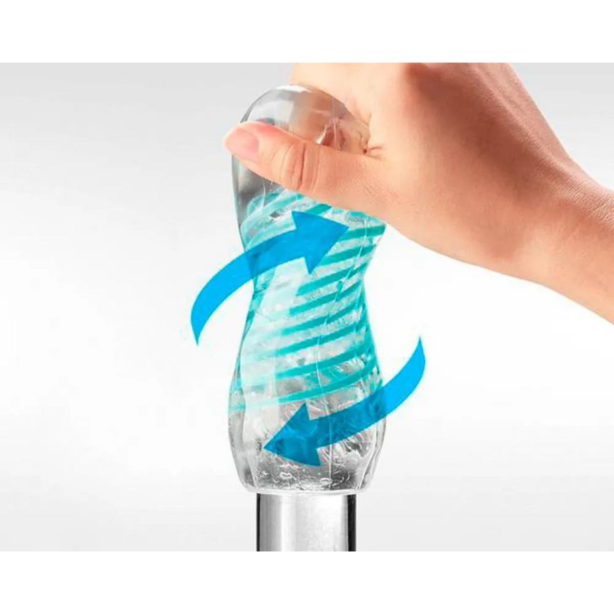 Dłoń obraca przezroczystą rączkę z niebieskimi strzałkami wskazującymi obrót.