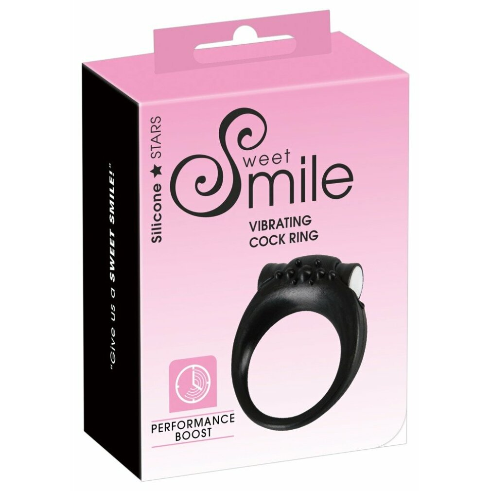 Ein schwarzer Vibrations-Cockring wird auf einer rosa Schachtel mit "Sweet Smile"-Branding gezeigt.