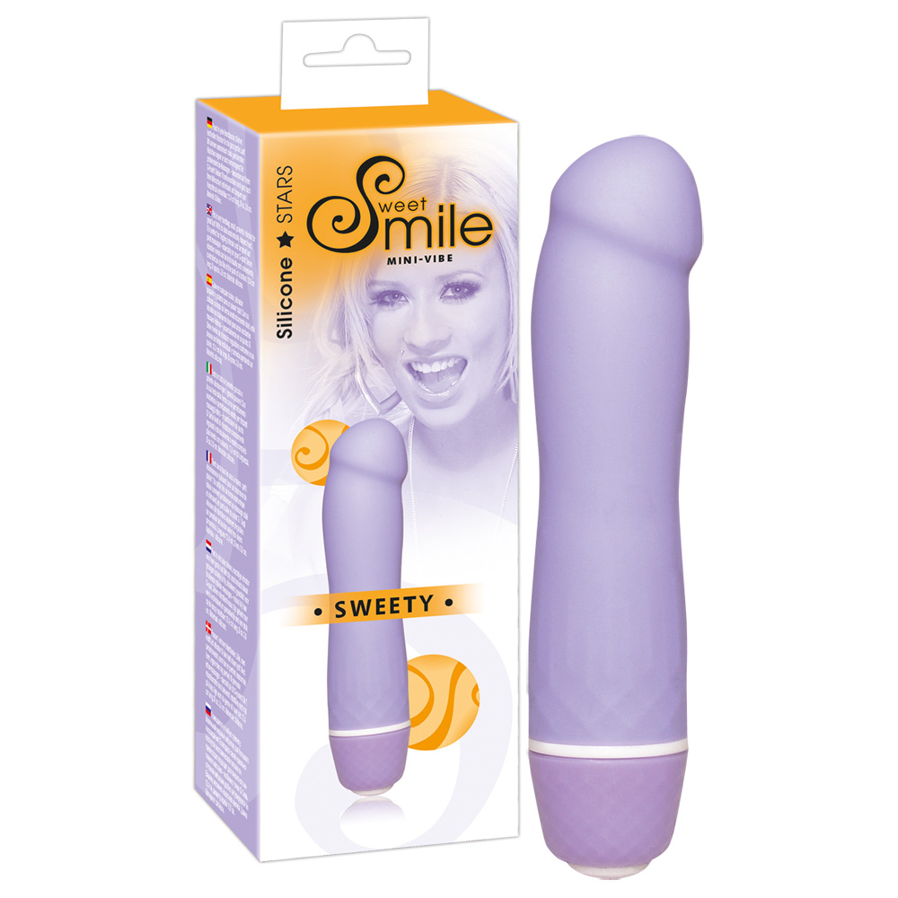 Lila Vibrator und Verpackung mit lächelnder Frau und Text 'SWEETY'