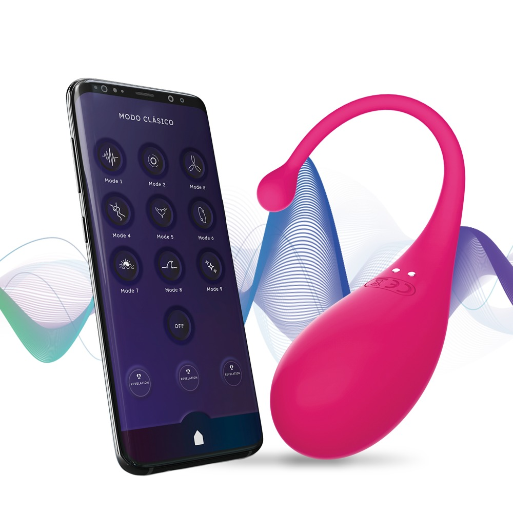 Ein pinker Vibrator neben einem Smartphone, das eine App mit verschiedenen Modi anzeigt.