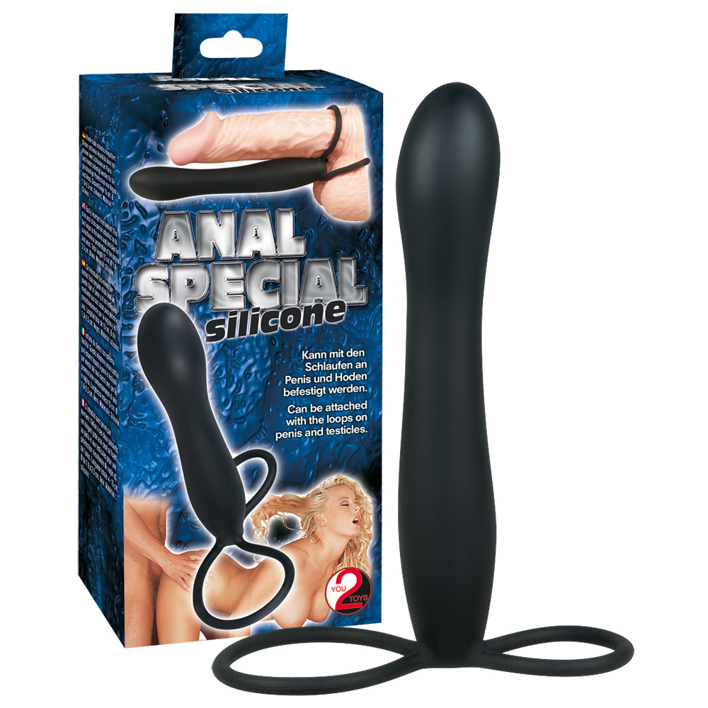 Schwarzer Silikon-Analplug mit Schlaufen, neben der Verpackung.