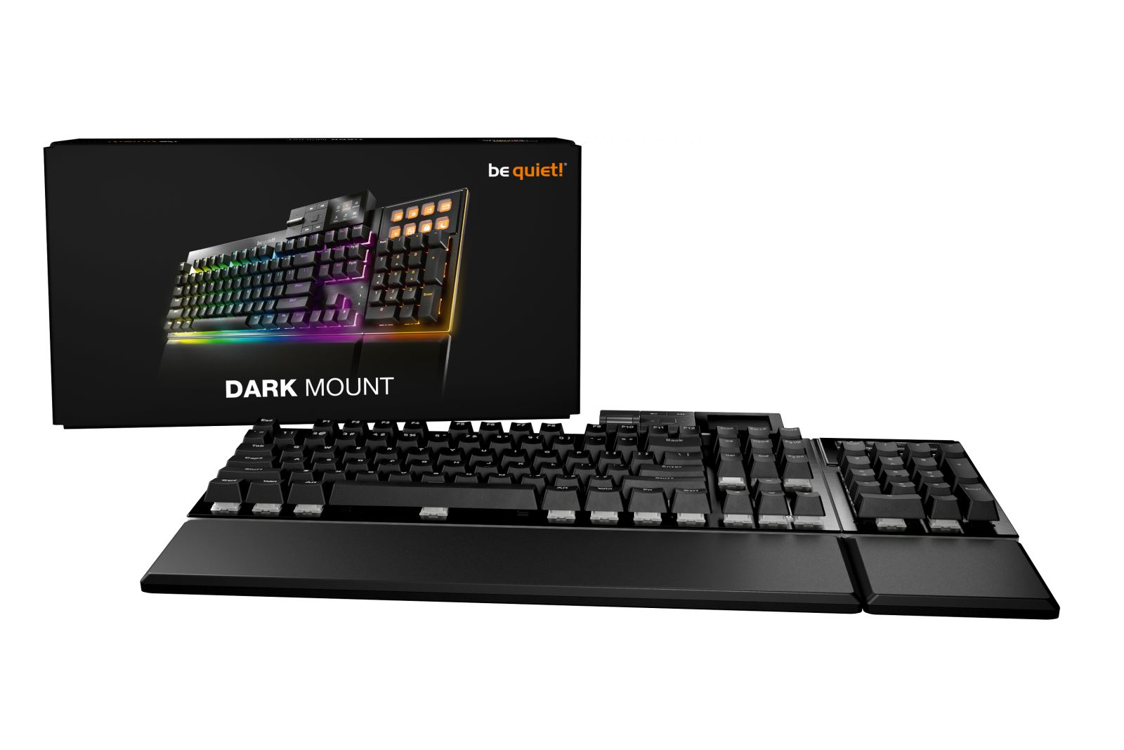 Schwarze Tastatur mit RGB-Beleuchtung und Handballenauflage, neben einer Verpackung.