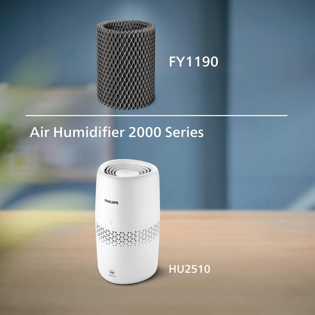 Philips Luftbefeuchter HU2510 und Filter FY1190 auf einem Holztisch.