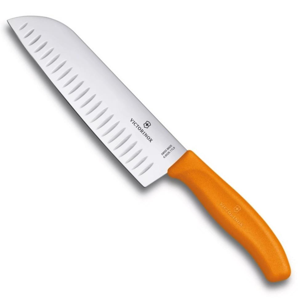 Beyaz bıçaklı ve turuncu saplı bir Victorinox şef bıçağı.