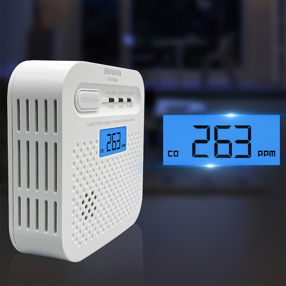 Biały czujnik tlenku węgla pokazuje 263 ppm, obok wyświetlacz również pokazuje 263 ppm.