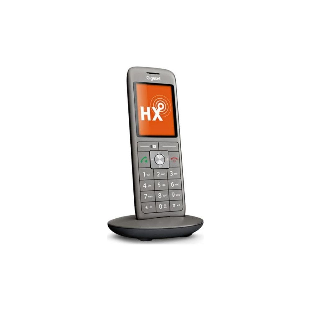 Ein graues Gigaset-Telefon mit orangefarbenem Display und HX-Logo steht auf einer Ladestation.