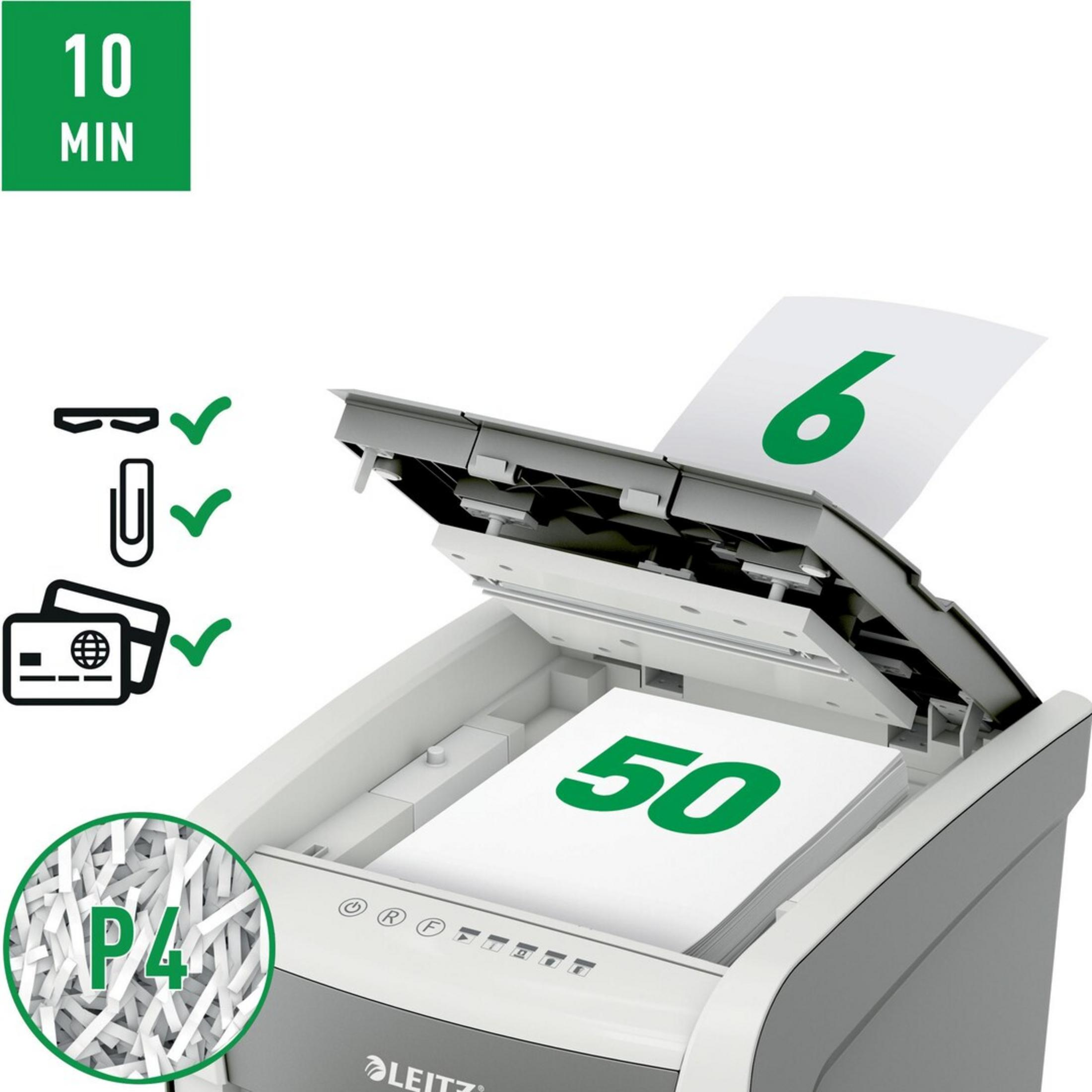 Une déchiqueteuse de papier avec une pile. "50" et "6" affichés sur le papier.
