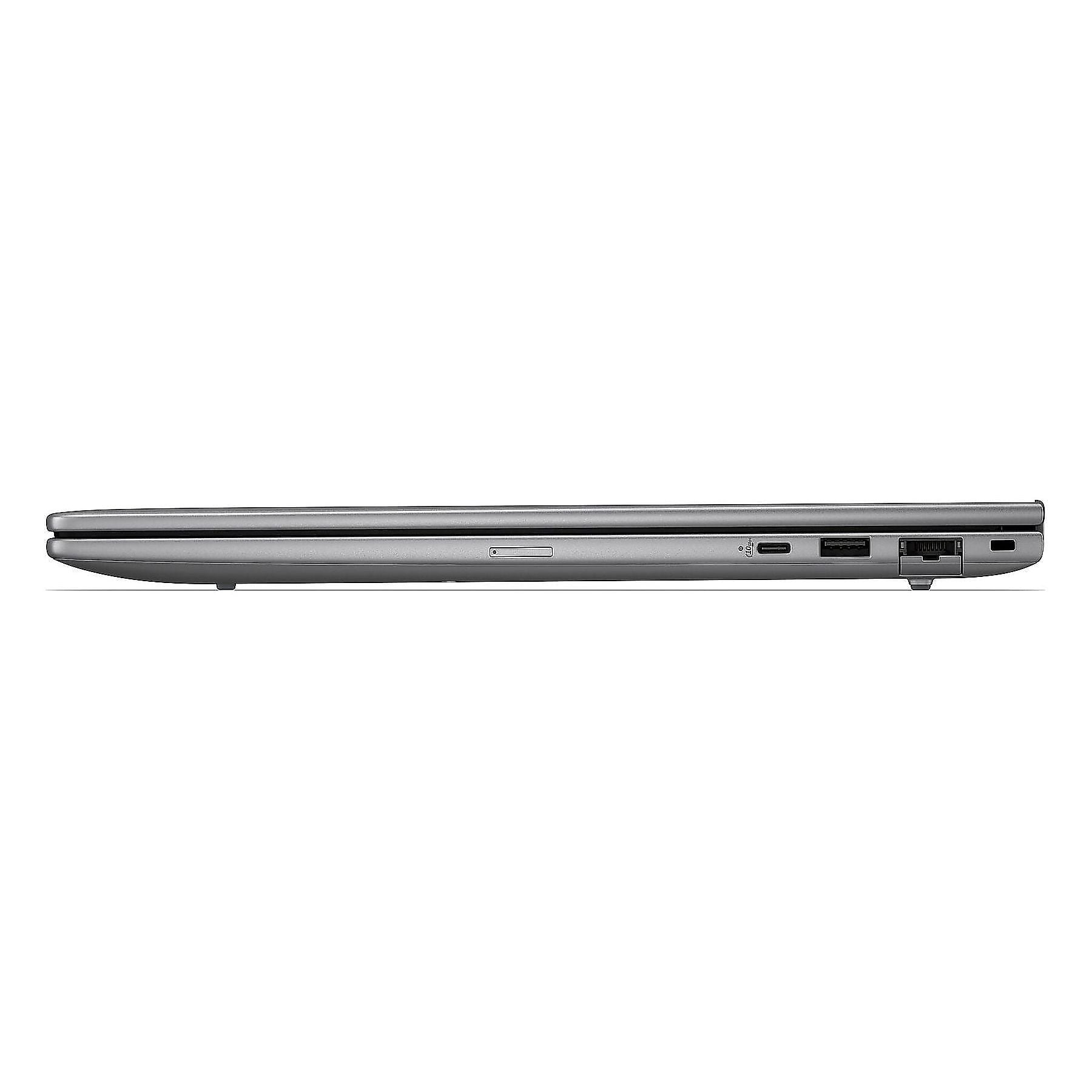 Vista laterale di un laptop argentato chiuso che mostra porte e design.