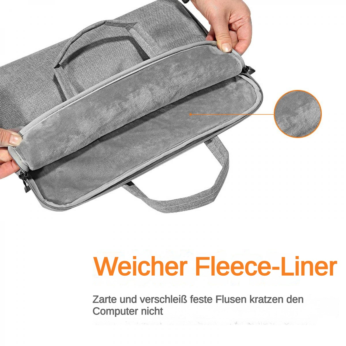 Graue Laptoptasche mit weichem Fleece-Innenfutter und Henkeln.
