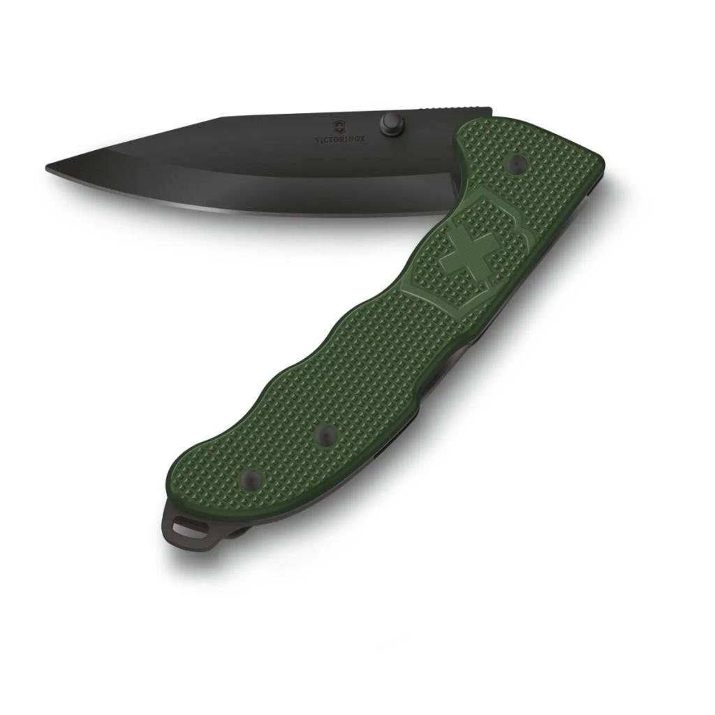 Siyah bıçaklı, yeşil saplı çakı. Saptaki Victorinox logosu.
