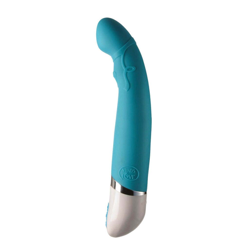Ein türkisfarbener Vibrator mit weißem und silbernem Sockel.